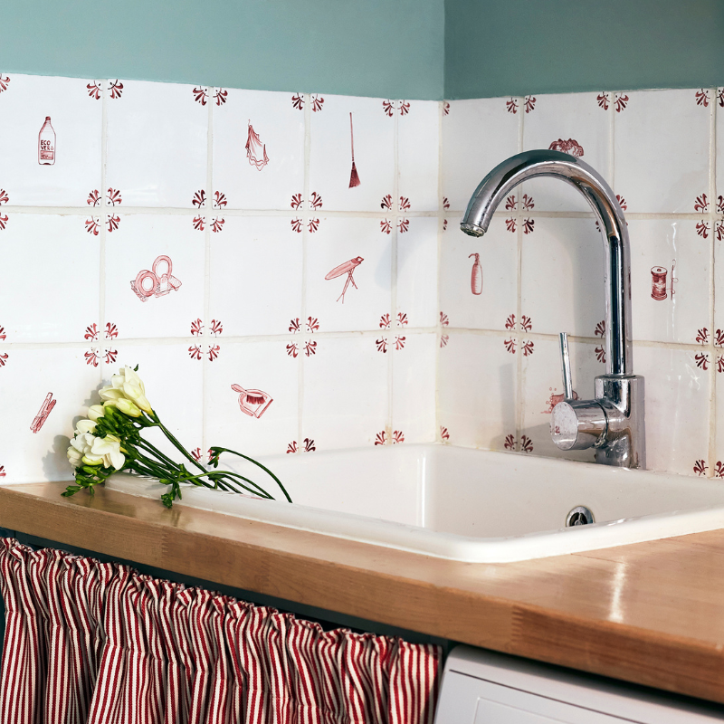 Crimson Delft Tiles in a Townhouse Laundry Room