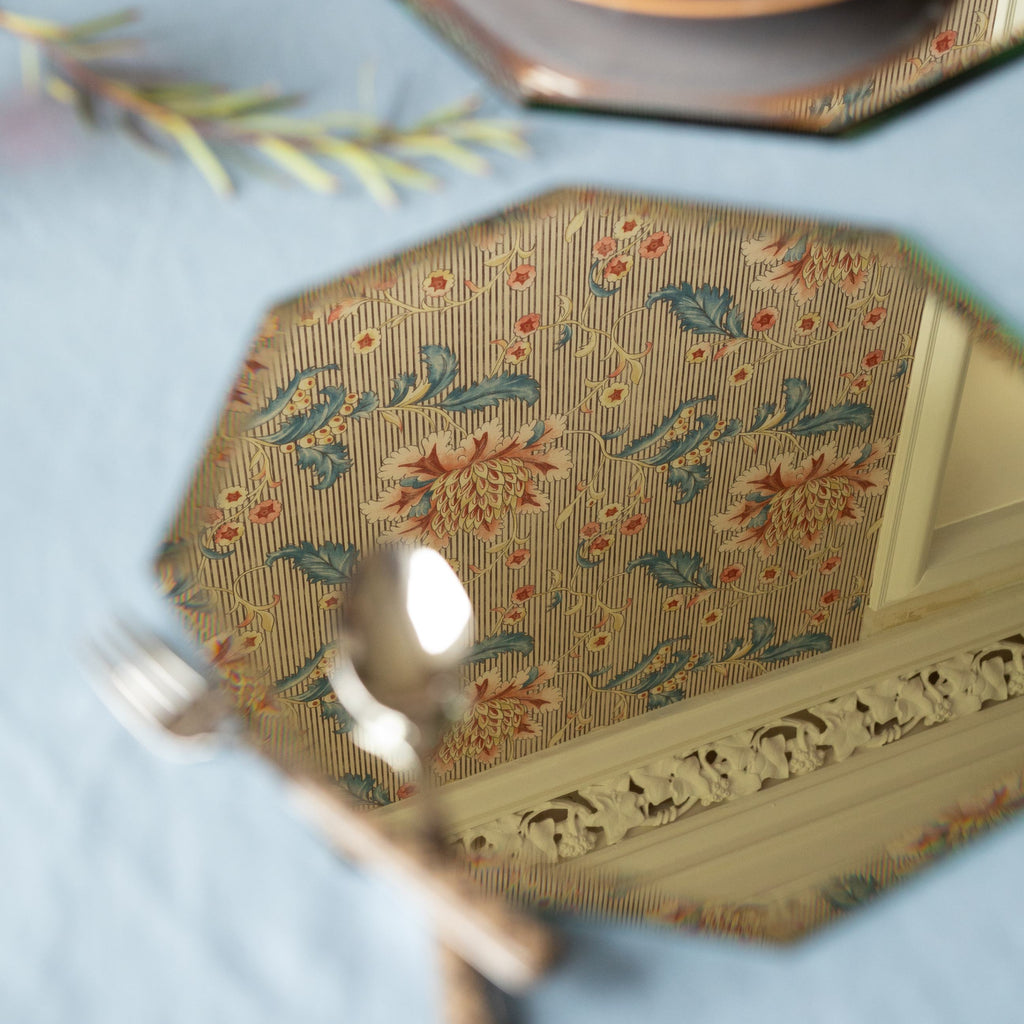 Mirrored hexagonal placemat on a table setting