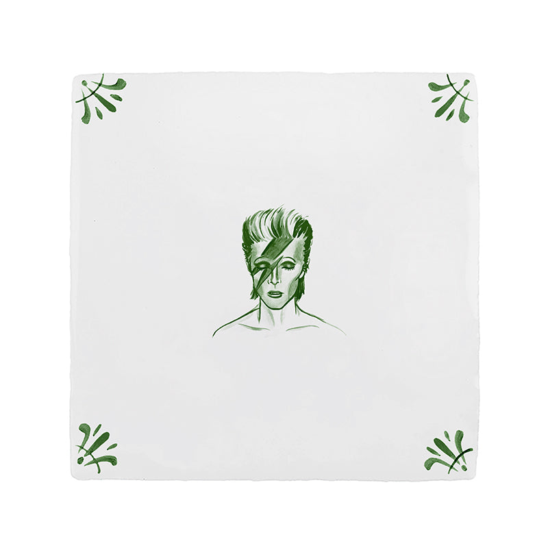 White tile with a green patten and illustration of David Bowie