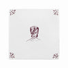 White tile with a manganese patten and illustration of David Bowie