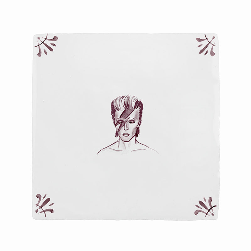 White tile with a manganese patten and illustration of David Bowie