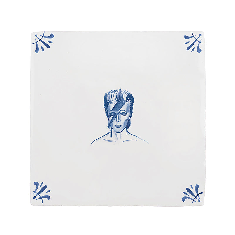 White tile with a blue patten and illustration of David Bowie