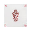 Tile with a red decorative vase design on a white background