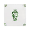 Tile with green decorative vase design on a white background