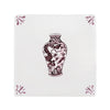 Tile with a decorative vase design on a white background