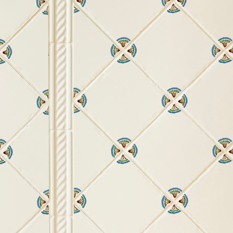 Decorative tiles with a corner floral design on a white background