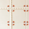 Decorative tiles with floral patterns on a white background