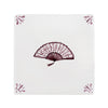 Decorative tile with a fan design on a white background