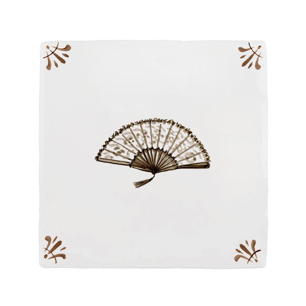 Decorative tile with a brown fan illustration on a white background