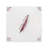 White tile with a feather design on a white background