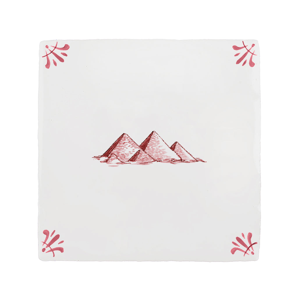 White tile with red pyramid design and border on a white background
