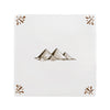 White tile with pyramid design and decorative elements on a white background