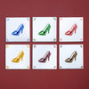Six tiles with colorful high-heeled shoes on a red background