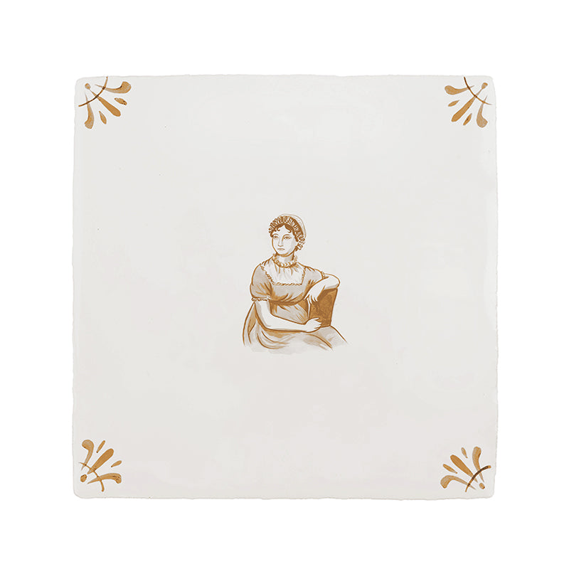 White ceramic tile with mustard decorative patterns and a Jane Austen illustration