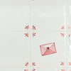 Decorative tiles with a love letter and heart design on a white background