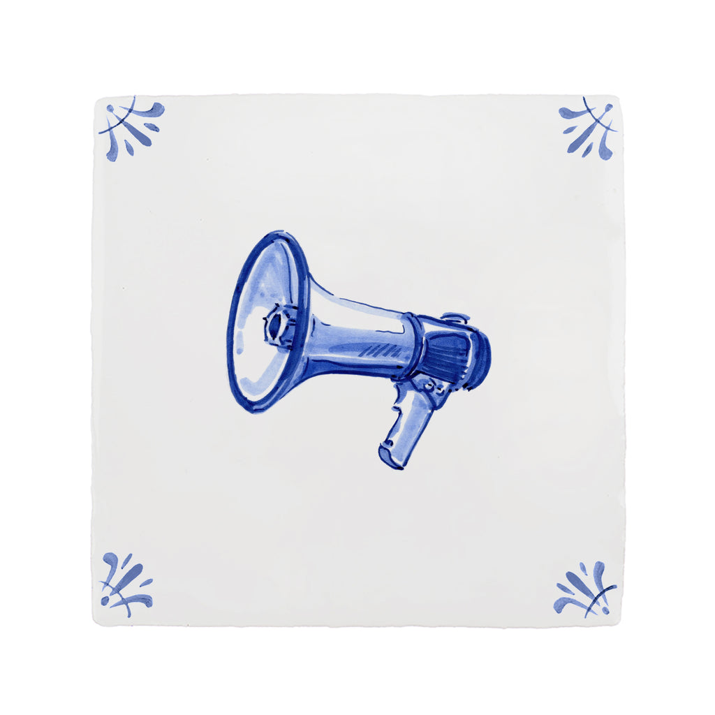 Blue megaphone on a white tile background with blue decorative elements