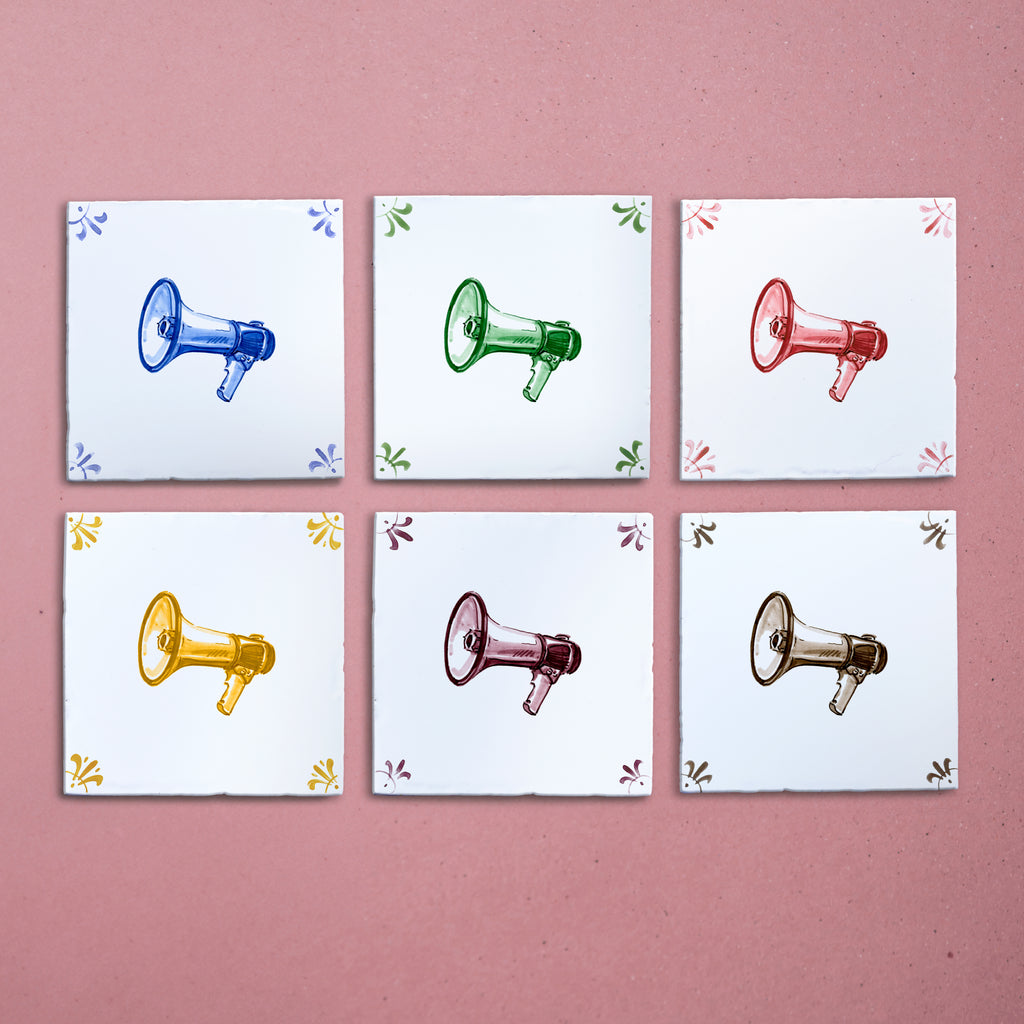 Six tiles with colorful megaphone illustrations on a pink background