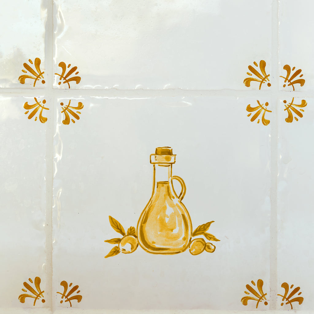 White tiles with a mustard bottle and olive design on a white background
