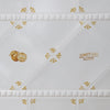 White tiles with mustard details featuring orange and 'Sunset Boulevard' illustrations.