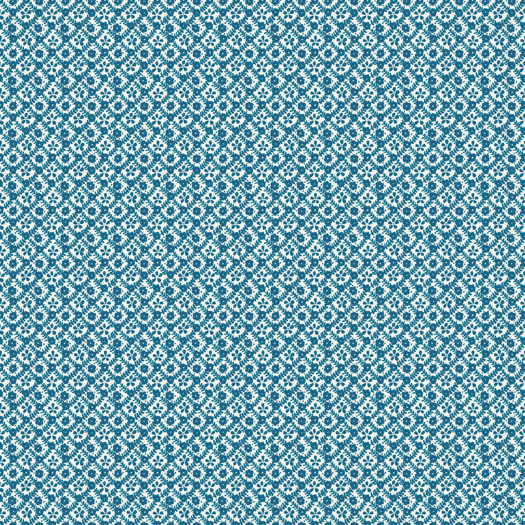 A close-up of a repeating blue and white floral or geometric pattern, likely a fabric or wallpaper swatch.