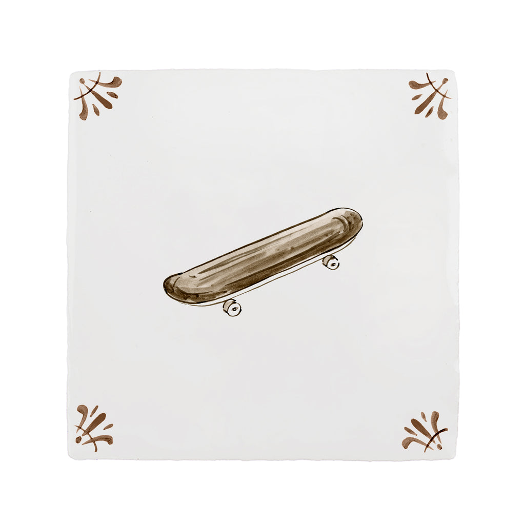 Skateboard design on a white tile background with decorative elements