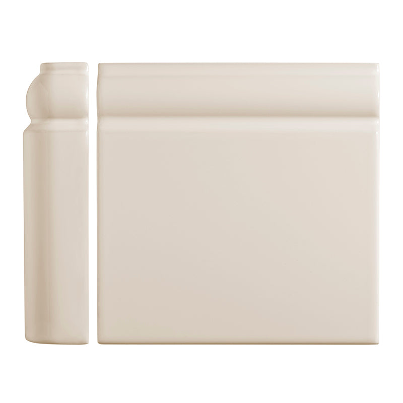 Decorative cream skirting tiles on a white background