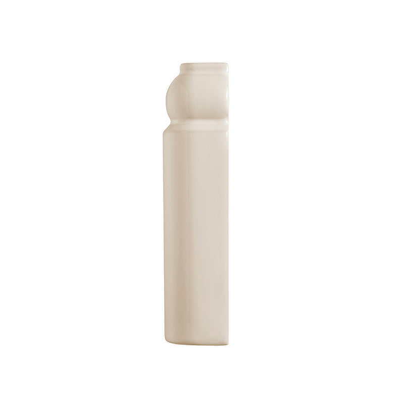 Cream corner skirting tile on a white background
