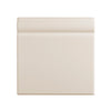 Cream ceramic skirting board tile on a white background