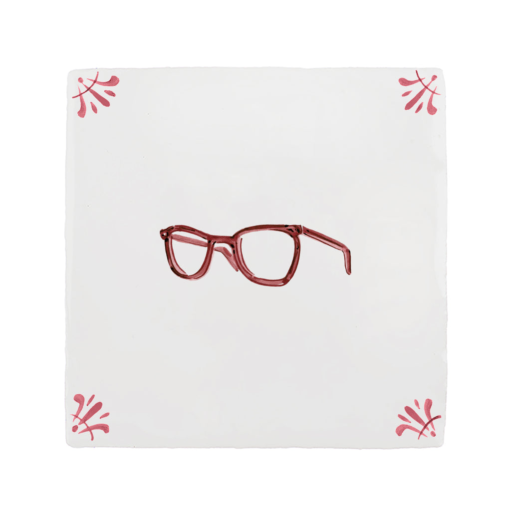 White tile with red glasses design and red decorative corners on a white background