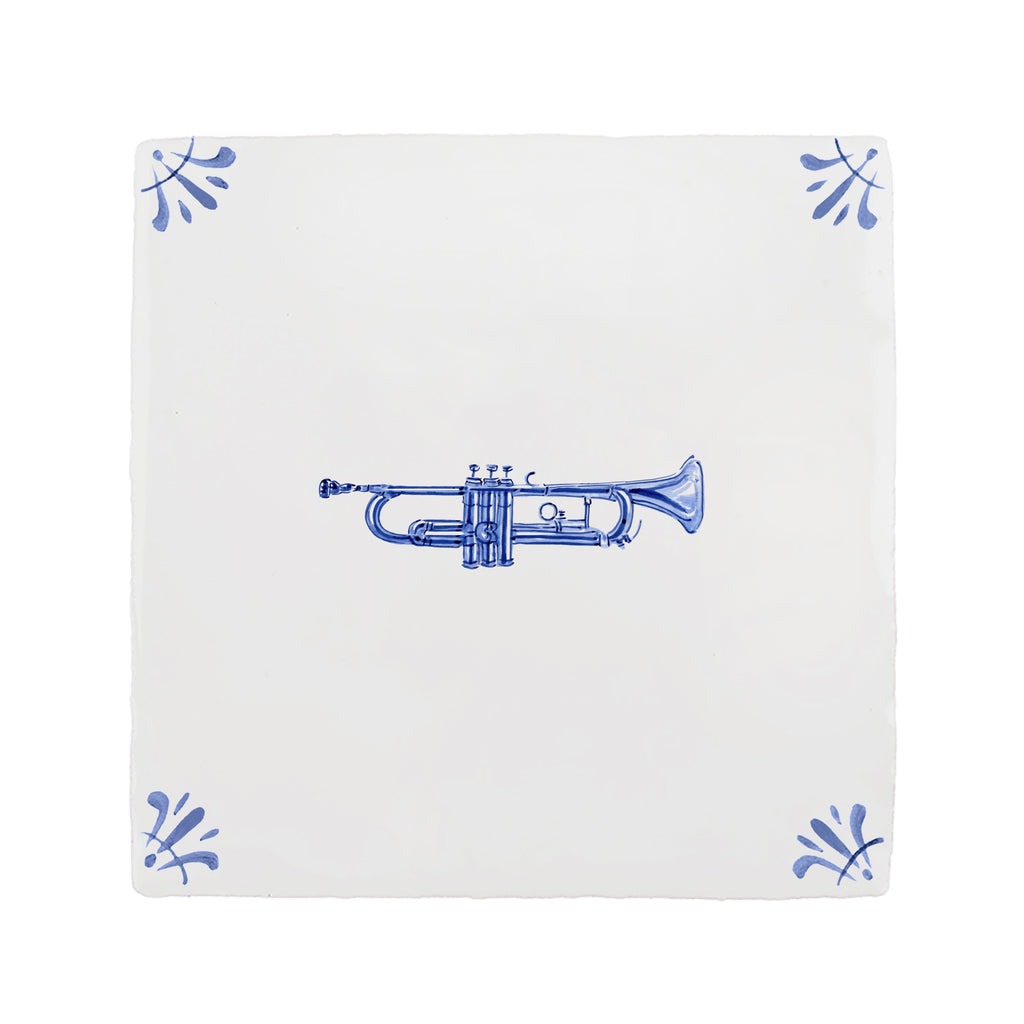 White tile with blue trumpet design on a white background