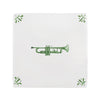 White tile with green trumpet design on a white background