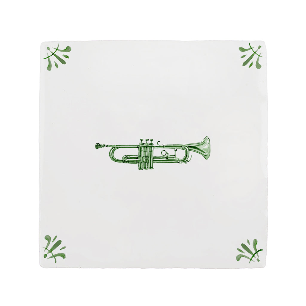 White tile with green trumpet design on a white background