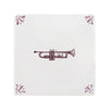 White tile with a trumpet design on a white background
