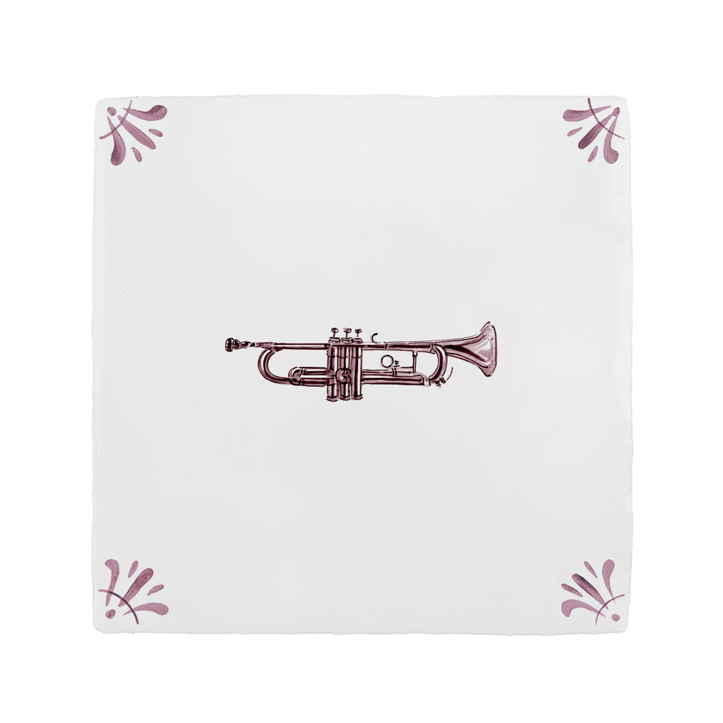 White tile with a trumpet design on a white background