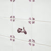 Decorative tiles with a scooter design on a white background